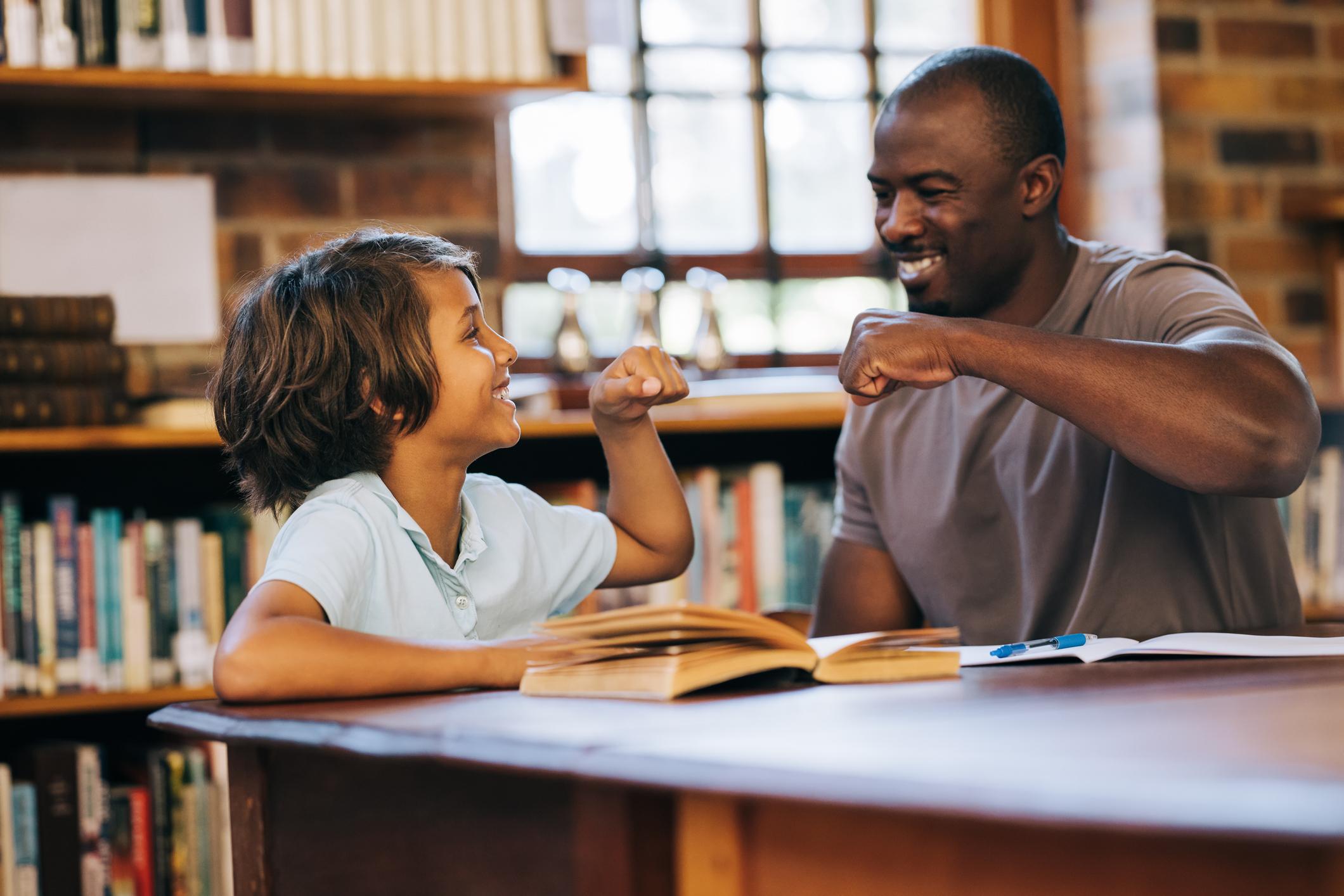 teacher talking to student